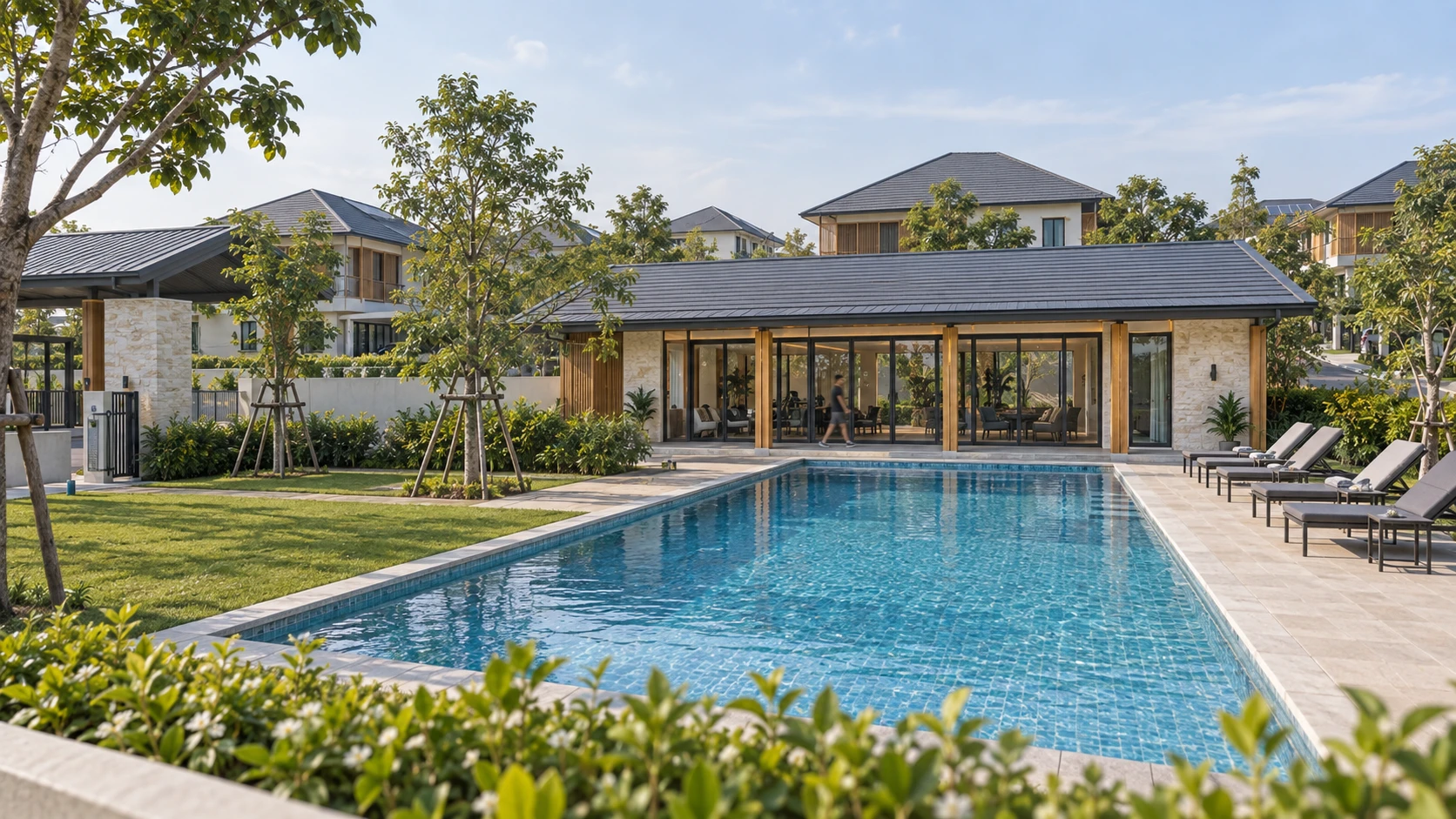 Exterior 3D render: clubhouse with glass doors facing a swimming pool and sun loungers
